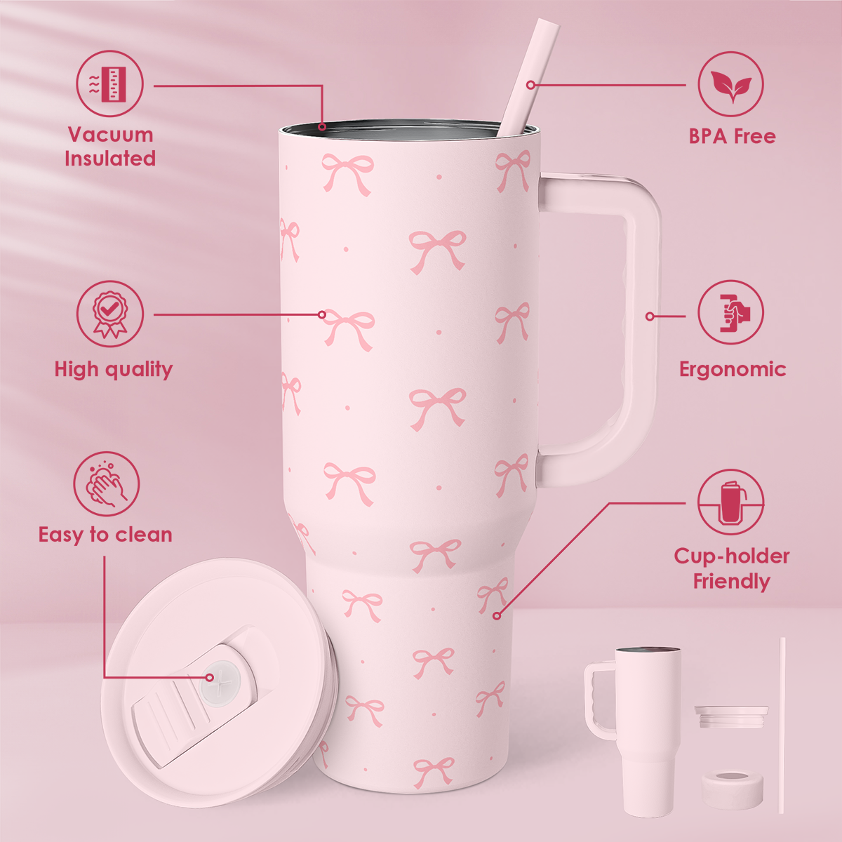 Pink insulated tumbler with handle, bow print, clear view of lid and straw