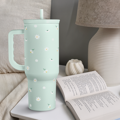 Mint daisy 40oz tumbler with handle and straw on table