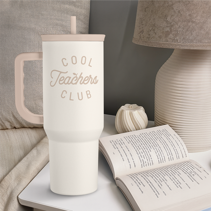 White 40oz tumbler with handle, straw, and “Cool Teachers Club” logo on front