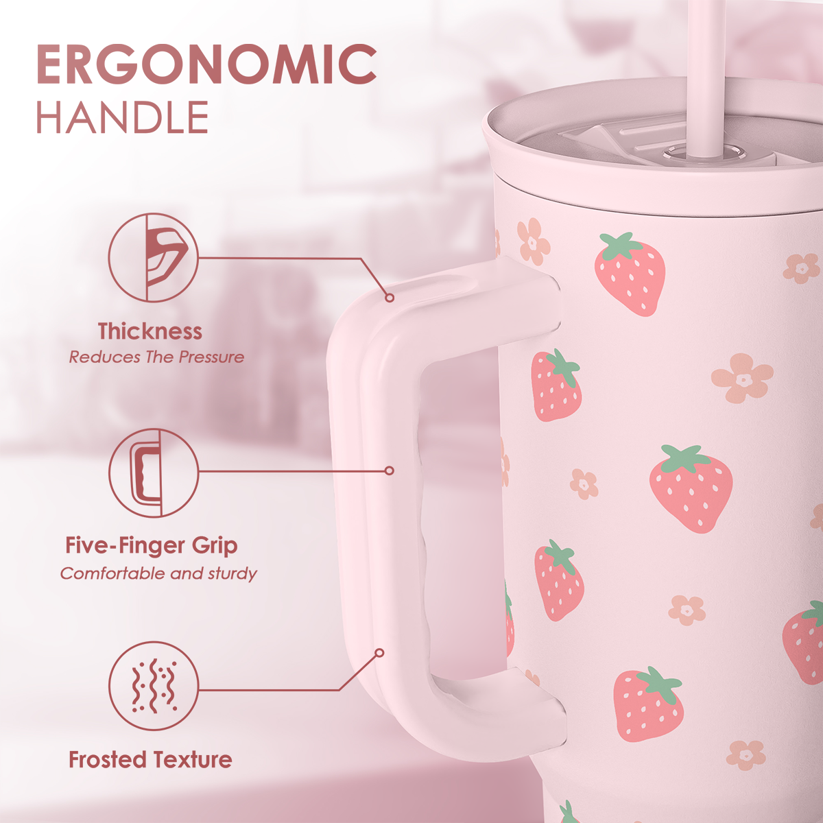 Pink strawberry-pattern tumbler featuring ergonomic handle and frosted grip texture