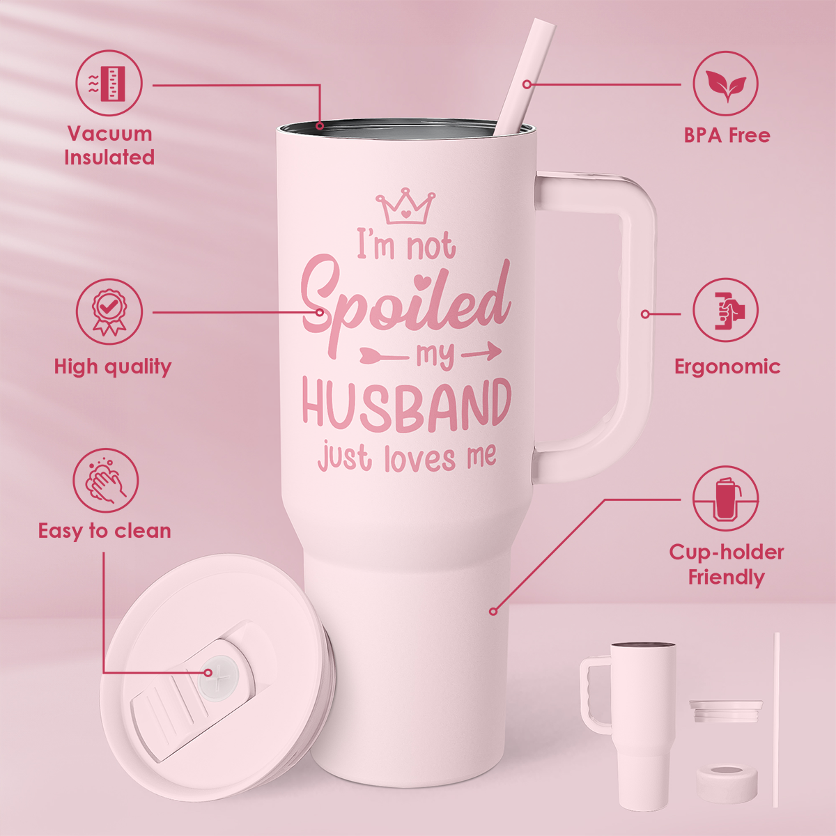 Pink insulated tumbler with handle and straw; “I’m not Spoiled my HUSBAND” design