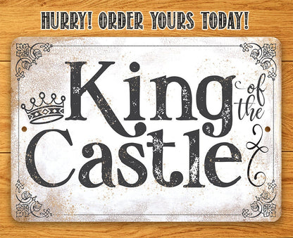 King of the Castle metal sign with crown and black vintage lettering, distressed finish