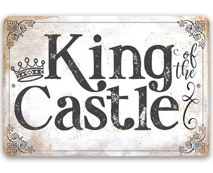 King of the Castle metal sign, crown and black vintage lettering on light background