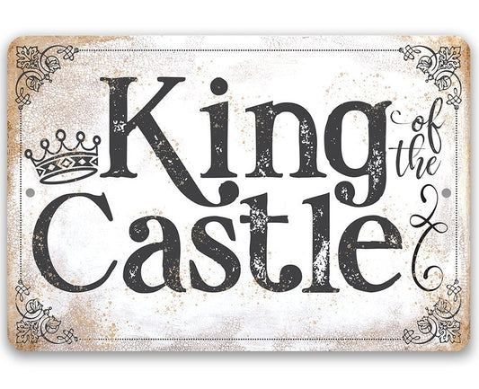 King of the Castle metal sign, crown and black vintage lettering on light background