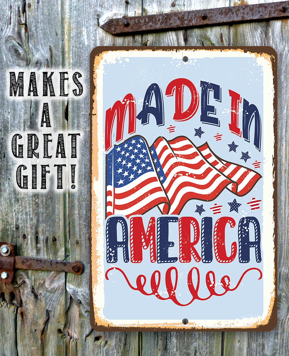 Patriotic metal sign with “Made in America” text and American flag graphic