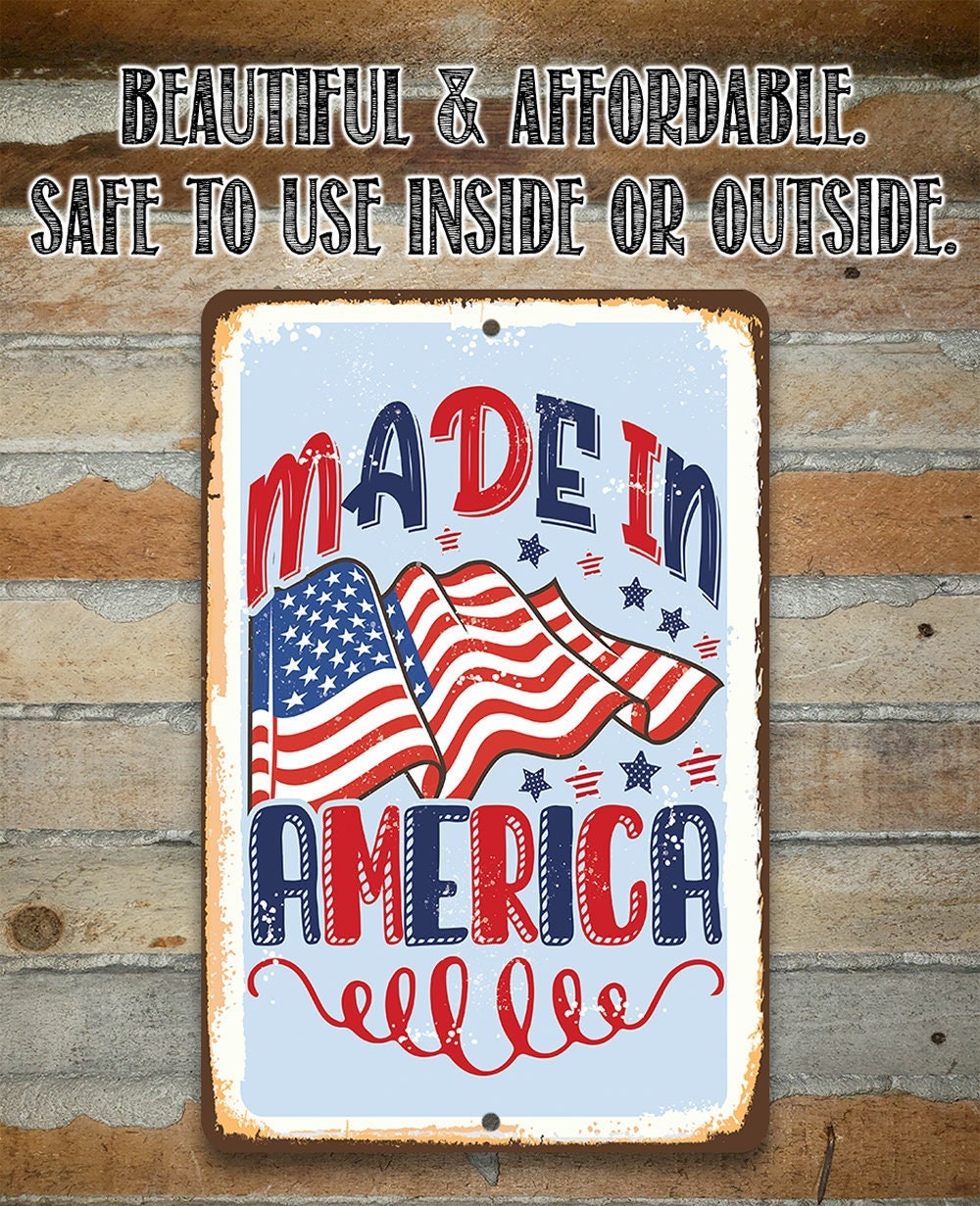 Patriotic metal sign with “Made in America” lettering and American flag illustration