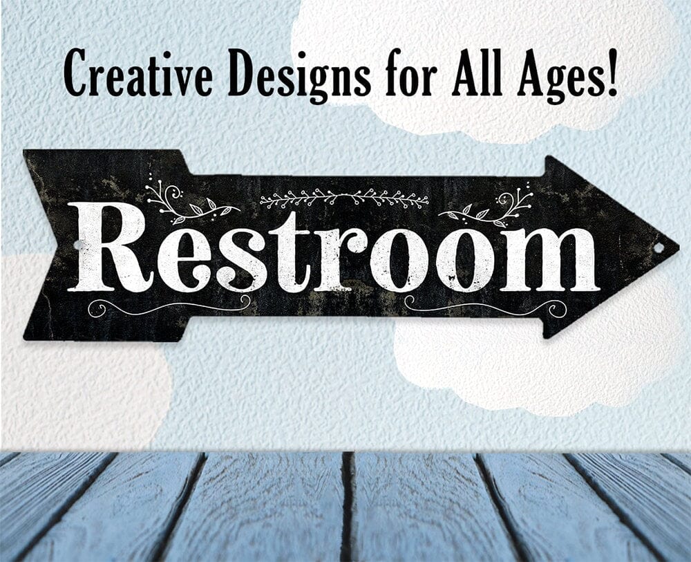 Restroom directional arrow metal sign on light background with cloud pattern