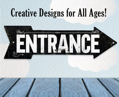 Black metal 'ENTRANCE' directional arrow sign with ornamental corner flourishes