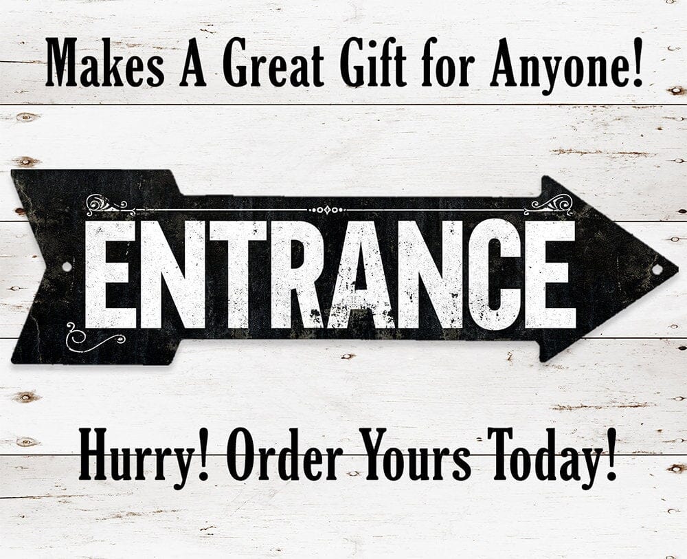 Black 'ENTRANCE' arrow sign with decorative scrolls and mounting holes
