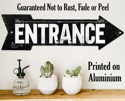 Black metal 'ENTRANCE' arrow sign, printed on aluminum with rust-fade-peel claim