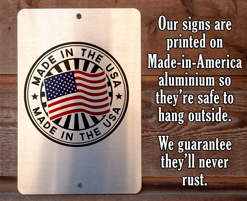 Made-in-USA metal sign with circular stamp and text about aluminum safety for hanging outside