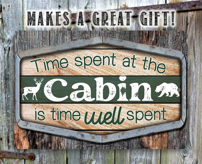 Cabin metal sign with “Make a Great Gift!” header and green “Cabin” panel with deer