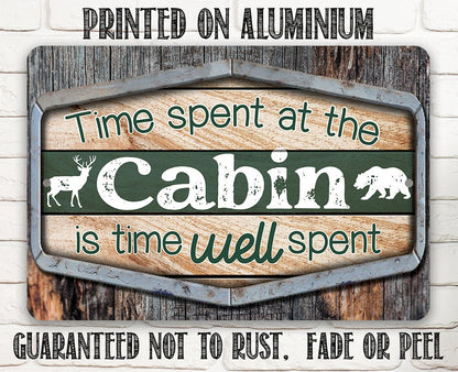 Cabin metal sign on aluminum with “Time spent at the Cabin” wording and deer silhouettes