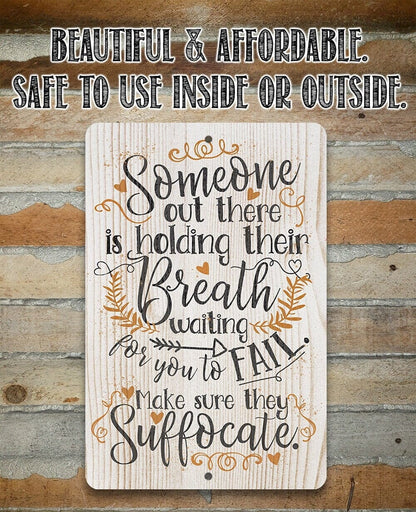 Metal sign with 'Someone out there is holding their Breath' quote plus hearts and leaves