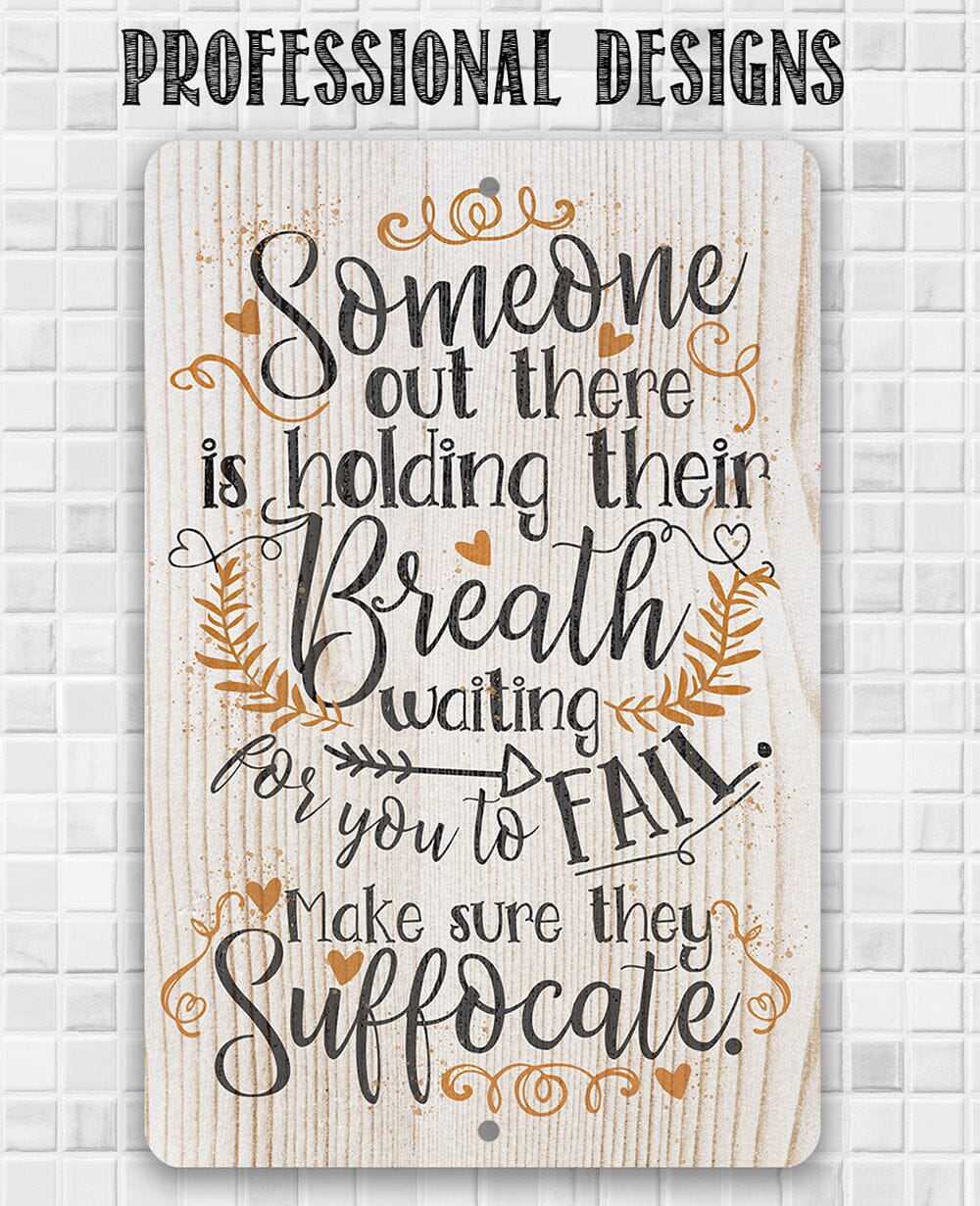 Metal sign with 'Someone out there is holding their Breath' script and leaf motif