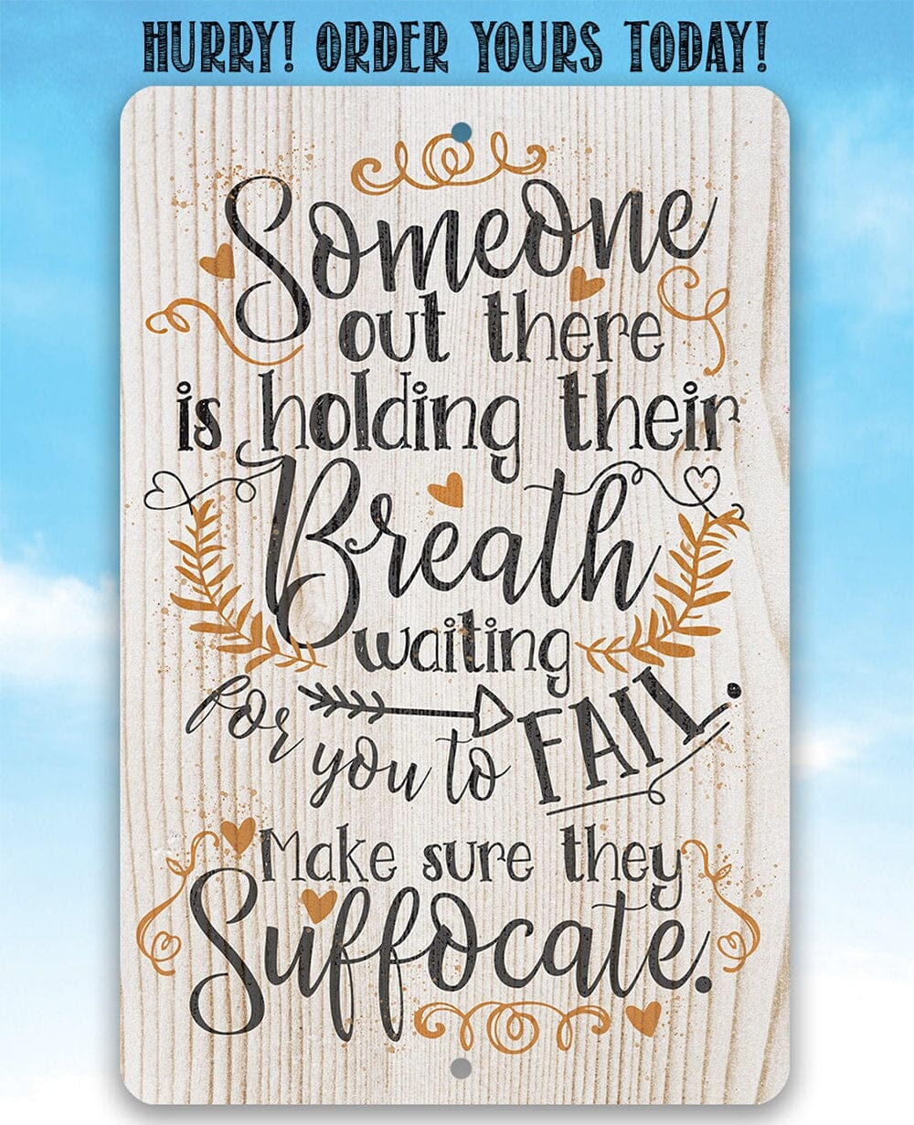 Metal sign with 'Someone out there is holding their Breath' quote and warm-toned accents