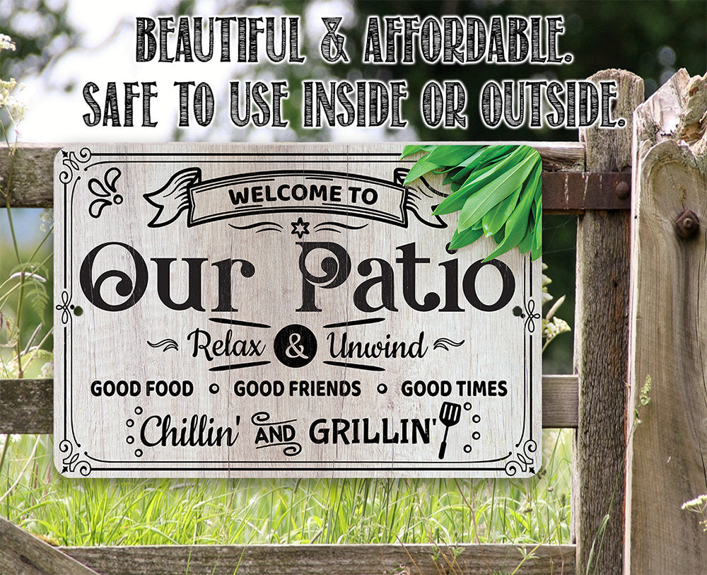 Patio welcome metal sign reading "Our Patio" with "Chillin' and Grillin'" lettering.