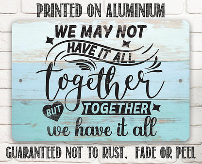 Aluminum metal sign reading 'Printed on Aluminum' and 'Guaranteed not to rust'.