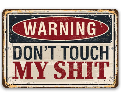 Distressed metal warning sign reading “WARNING DON'T TOUCH MY SHIT” in red and white