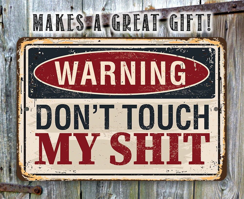 Distressed metal warning sign reading “WARNING DON'T TOUCH MY SHIT”