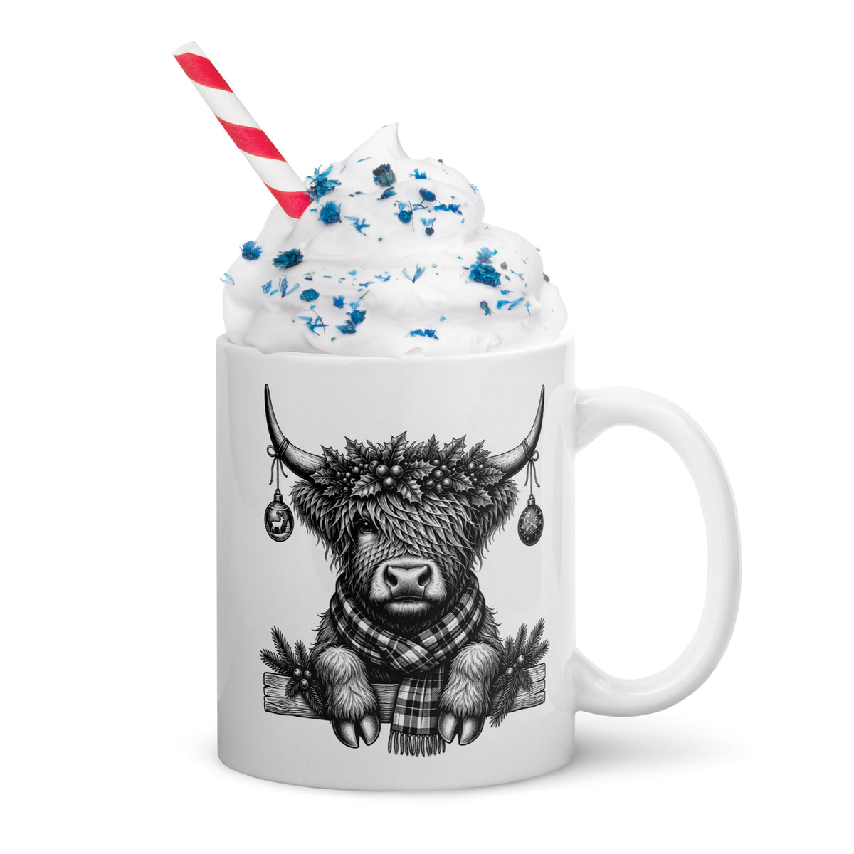 White mug with highland cow portrait, whipped cream topping, red-white striped straw, handle