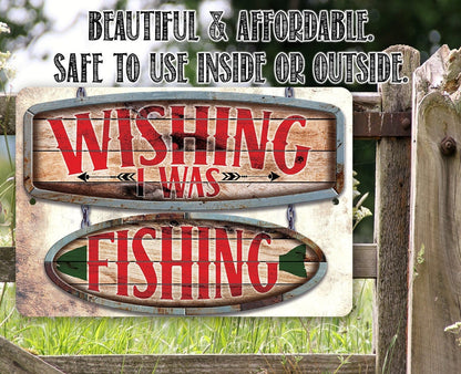 Outdoor metal fishing sign on a fence with red "Wishing I was" and "Fishing"