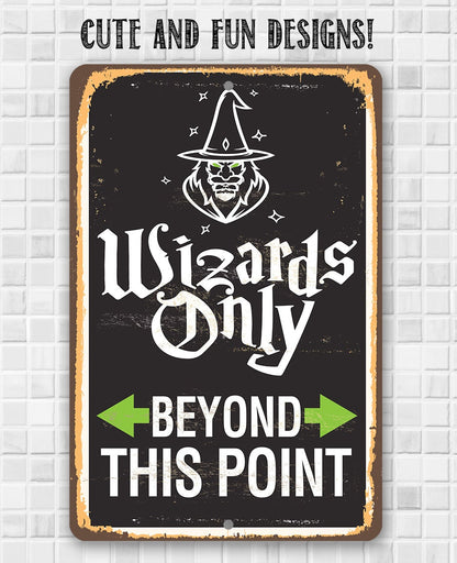 Black wizard warning metal sign with “Wizards Only” and green arrow “Beyond This Point”