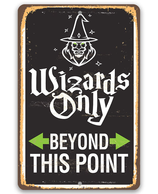 Black metal wizard sign with “Wizards Only” and “Beyond This Point” text